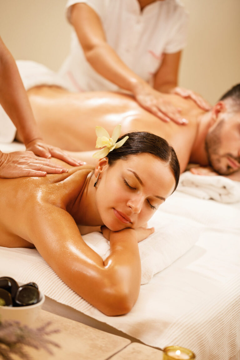 Young Couple Relaxing During Back Massage Health Spa Focus Is Young Woman